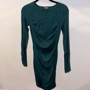 Long sleeve, dark green dress, rushed front
